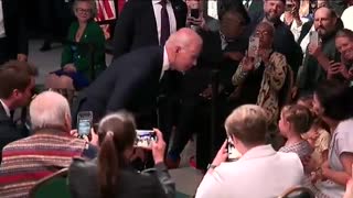 Biden Whispers to Two Young Girls Then Promises Them Ice Cream in Middle of a Speech