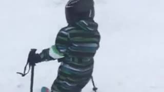 Kid is learning to ski