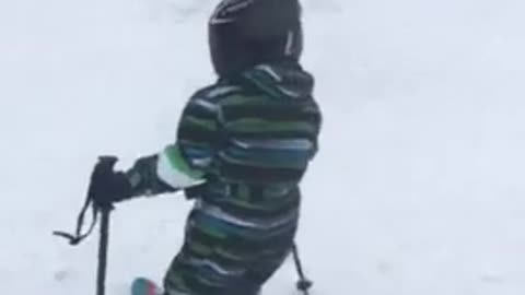 Kid is learning to ski