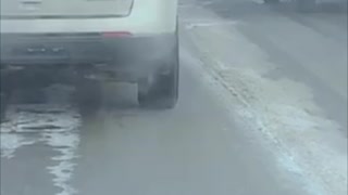 Motorist Launches Water Bottle in Traffic