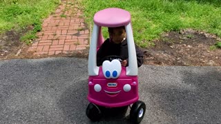 Girl in baby car