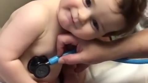 Cute baby put his head on nurse hand 😍