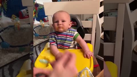 cute faces babies make when eating lemon