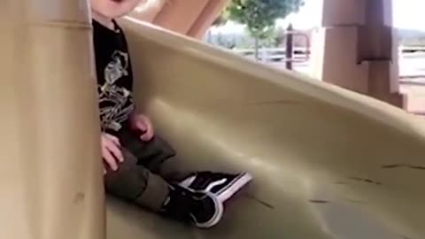 My nephew is really excited in the electrical slide