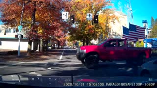 Truck with Trump Flag Runs Red Light