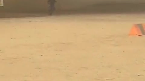 Run Forest, run! Russian Soldier tries to outrun a sandstorm