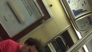 Guy red shirt eating chips out of yellow bag weird