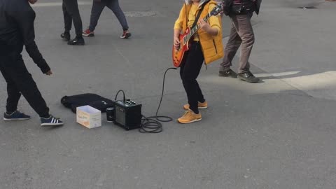 Street Performing Kid Shreds Classic 'Metallica' Song On Guitar