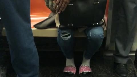 Woman on train cusses out a guy for trying to hit on her