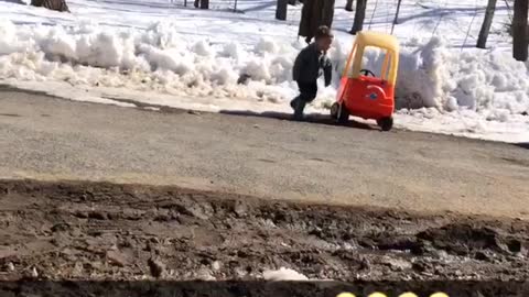 Kid's Toy Car Gets Stuck in the Snow