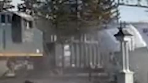 Driver makes lucky escape seconds before train CRASHES into truck