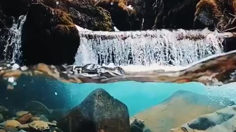 A relaxing view of the movement of river water with the sound of trickling water