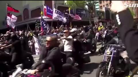 President Trump flags being waved at a biker rally against covid rules in New Zealand.