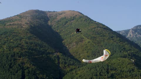 Acro Paraglider Shows Off Infinity Tumbling