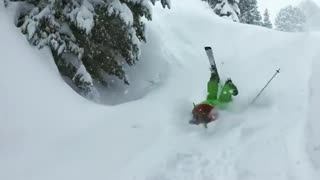 Green pants pink goggles ski fail