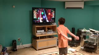 Spencer playing fruit ninja VID_20180804_194854