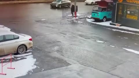 Woman almost hit by a car
