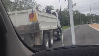 Police Ride Unsecured in Back of Utility Truck