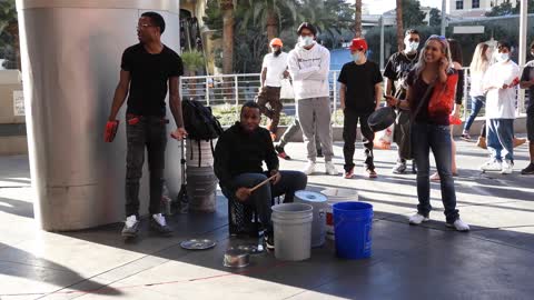 Street drummer in action on the Las Vegas strip.