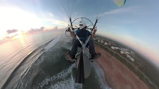 Paramotor with trike Ormond by the sea.