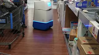 Big Box Store Robot Roams the Aisle