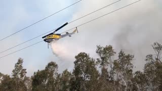 Helicopter Helps Extinguish Flames