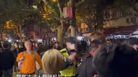 Reporter ripped from Chinese protests can be heard "call the consulate now"