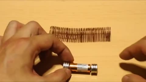 Electromagnetic train Magnet + Coil of copper wire + Battery = Magic