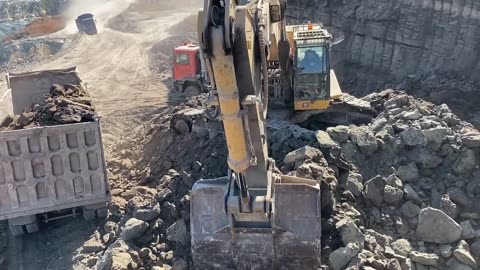 Caterpillar 385C Excavator Loading Mercedes And MAN Trucks - Ektor EPE