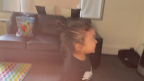 Kids feel shy when he notice his mom was filming him