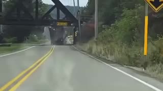 Truck Driver Ignores Low Clearance Warning