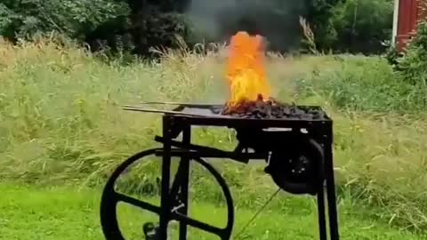 Innovative Outdoor Grill with Spinning Wheel