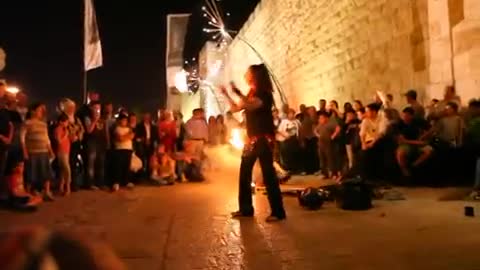 Girls juggling with fire, at the Jerusalem Festival of Lights