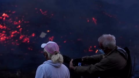 Tourists flock to view destructive Spanish volcano