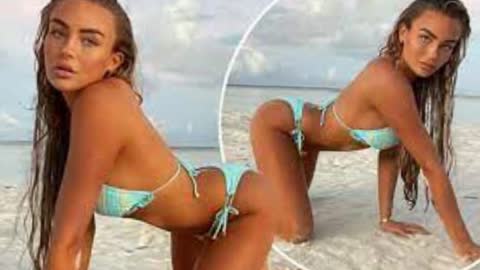 ‘TOWIE’ Ella Rae Wise Crawls Across Sandy Beach In String Bikini
