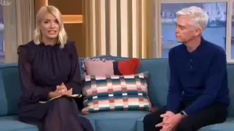 COVER UP = Phillip Schofield quits top UK morning show