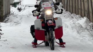 Test Driving a Motorcycle Snowmobile