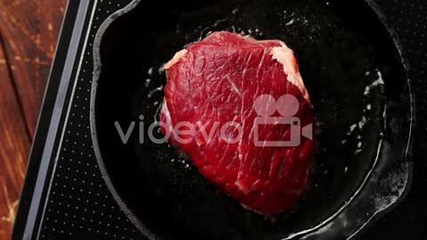 Big piece of meat on pan