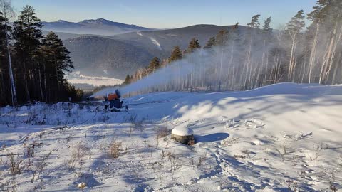 blowing snow in a ski resort