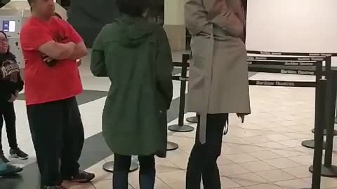 Two kids dressed as a tall man to get into “Black Panther” is caught on video