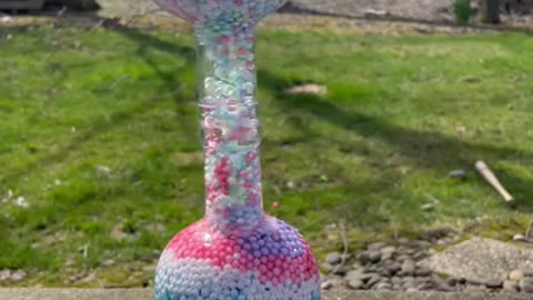 Moving Beads in Glass Bottles -- ViralHog