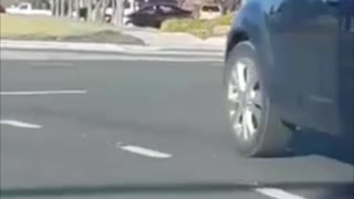 Strange Scenes as Man Hangs Onto Car Hood