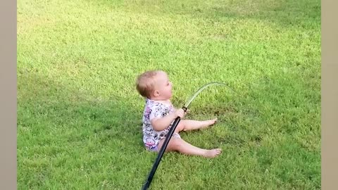 Funny Babies Playing With Water