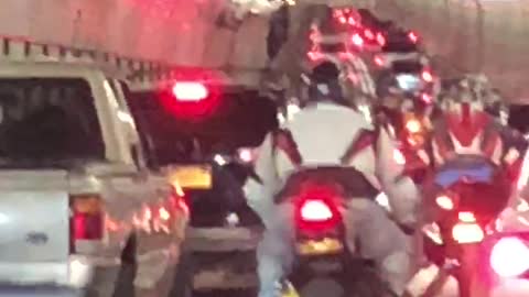 Motorcycle Gang drive reckless in gridlock traffic