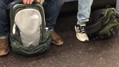 Man makes peanut butter jelly sandwich on subway