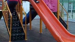 Litle girls on the slides