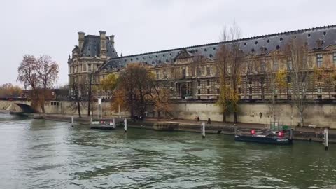 Cloudy day cruise ship and Orsay museum