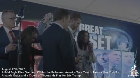 Eric Trump | A Bald Eagle Flies Over and Circles the ReAwaken America Tour Tent In Batavia New York As Amanda Grace and a Crowd of Thousands Pray for Eric Trump