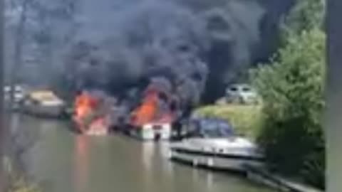 Moment boat explodes in fireball and sets other boats alight