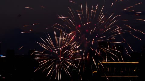 Fireworks iluminate the city night